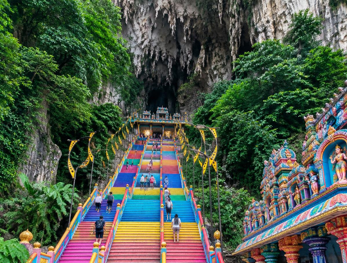 Colourful staircase leading to a limestone cave temple near Kuala Lumpur